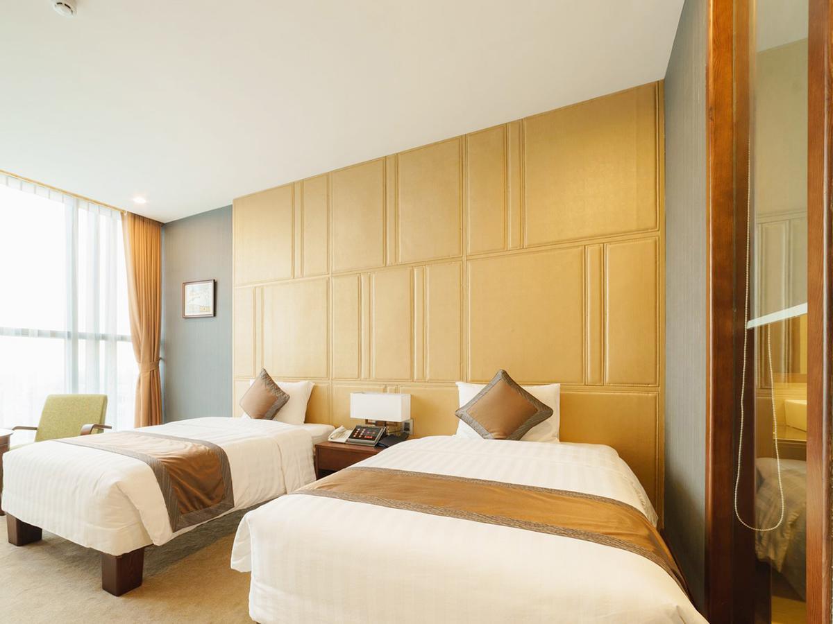 Bien Bac Hotel Mong Cai Bagian luar foto