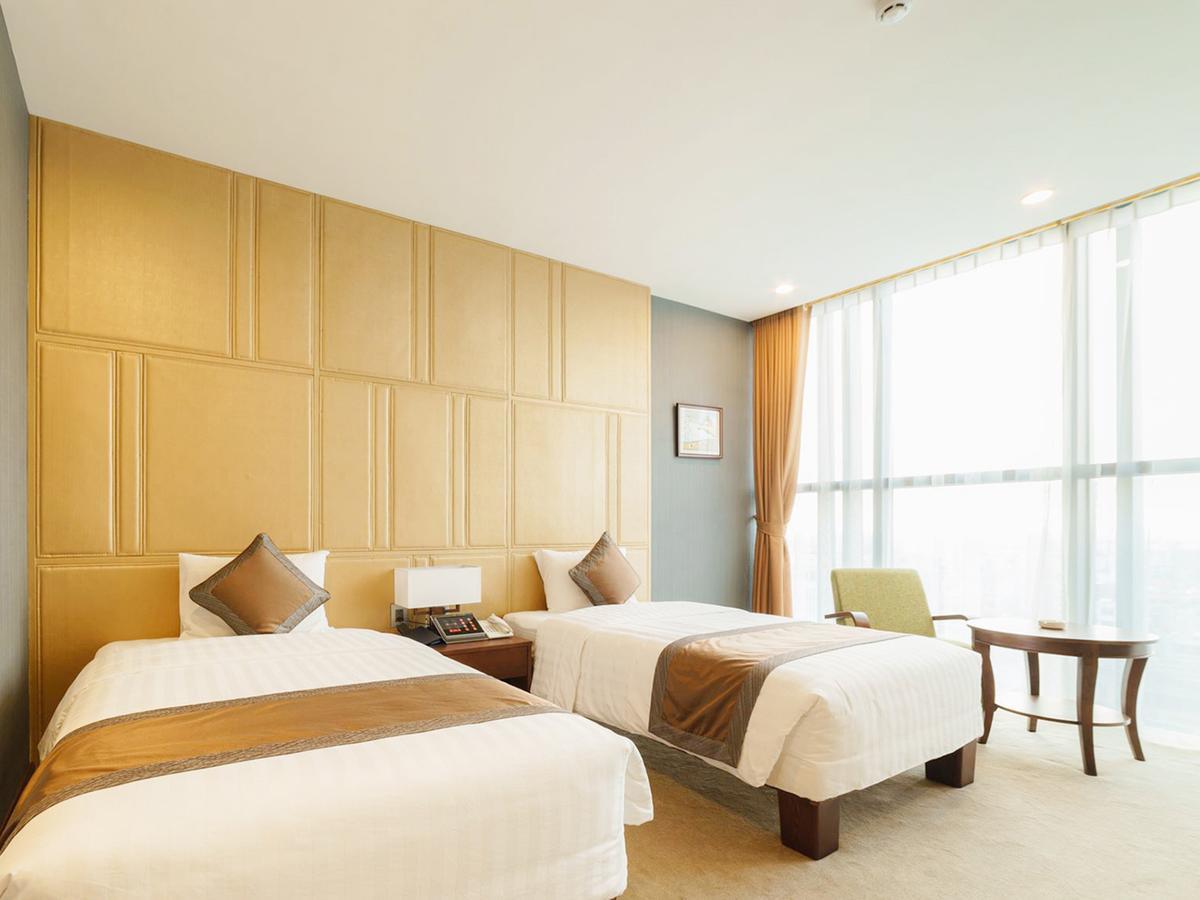 Bien Bac Hotel Mong Cai Bagian luar foto